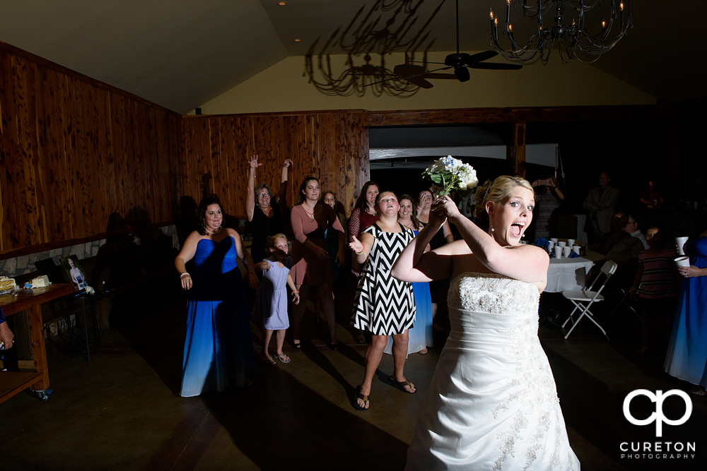 Bride tossing the bouquet.