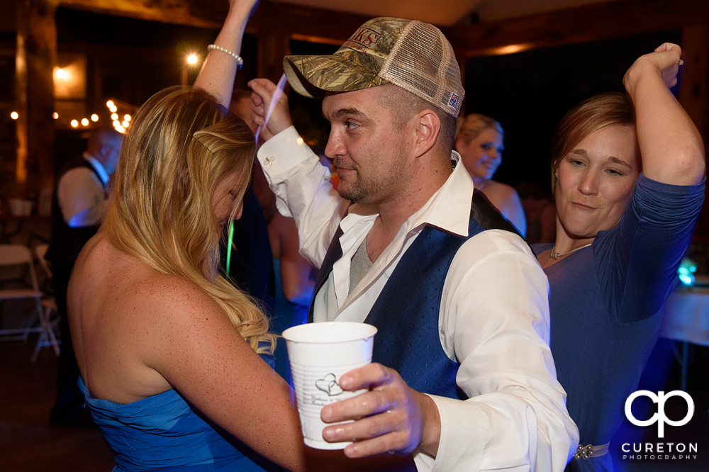 Wedding guests dancing.