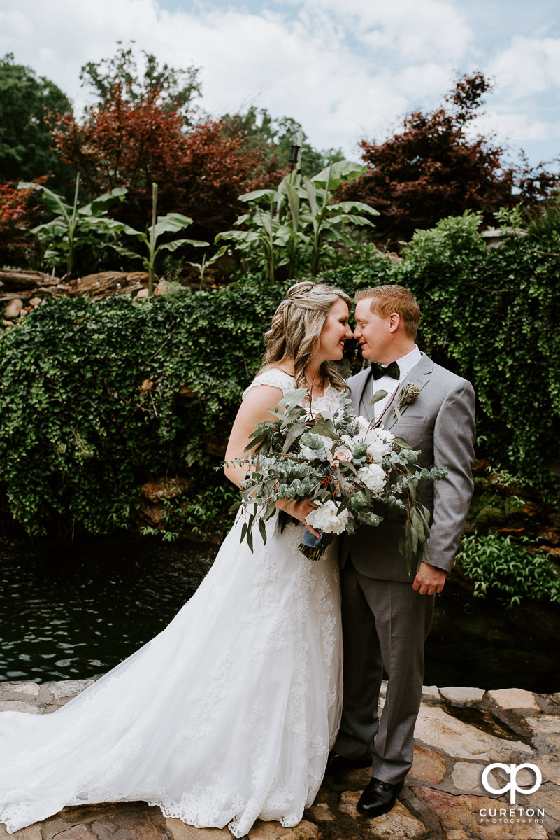 Bride and groom before their wedding ceremony at The Hollow at Paris Mountain.