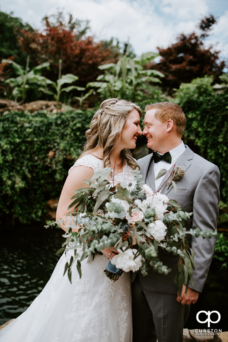 Bride and groom before the wedding at The Hollow at Paris Mountain in Greenville,SC.