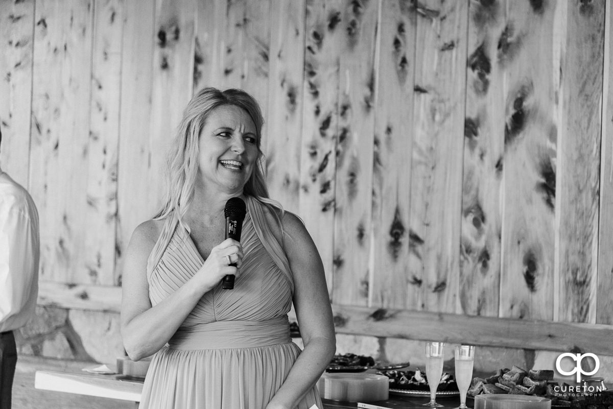 Bridesmaid giving a speech.