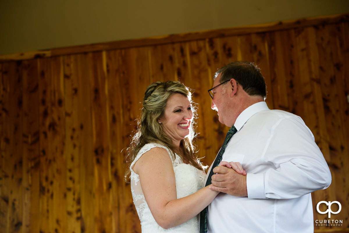 Bride dancing with her father.