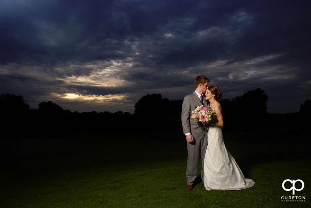 Bride and groom at sunset.