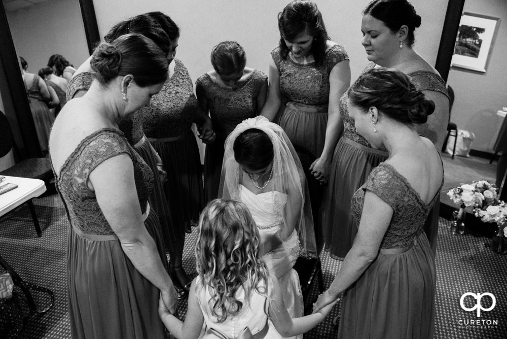 Bride praying.