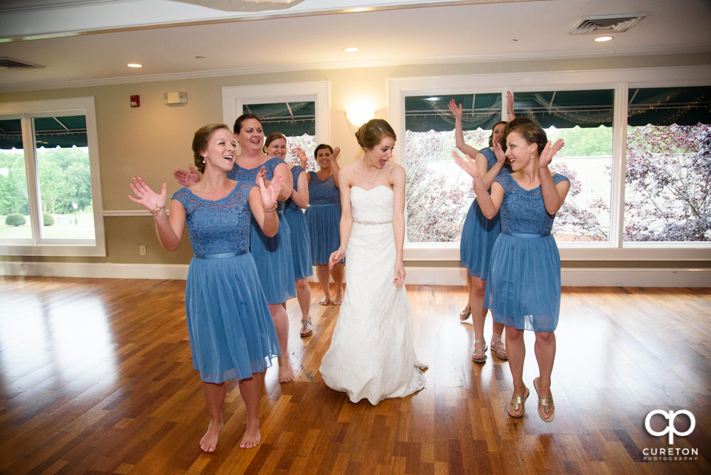 Guests dancing at the wedding reception.