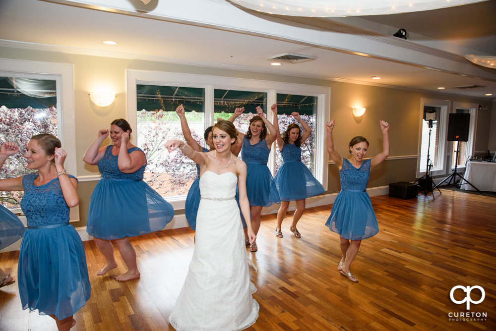 Guests dancing at the wedding reception.
