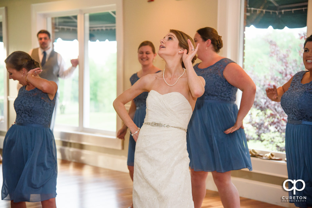 Guests dancing at the wedding reception.