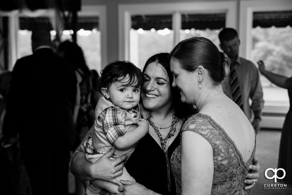 Guests dancing at the wedding reception.