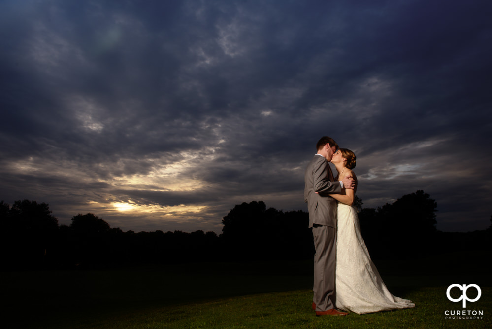 Bride and groom at sunset.