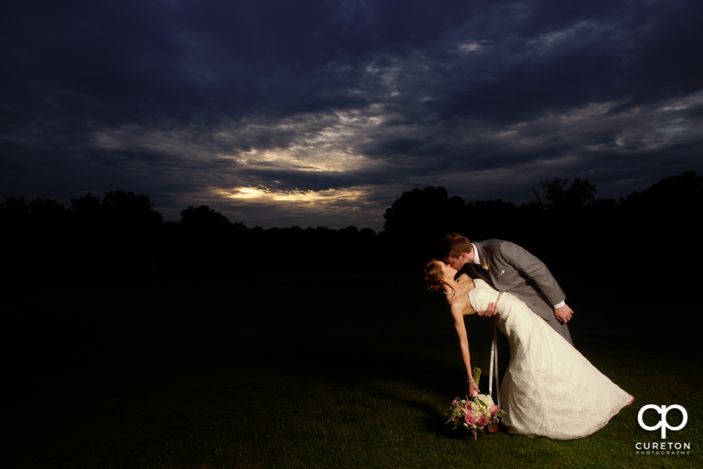 Bride and groom at sunset.