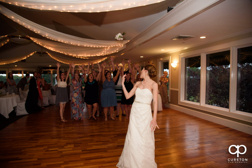 Bride tossing the bouquet.