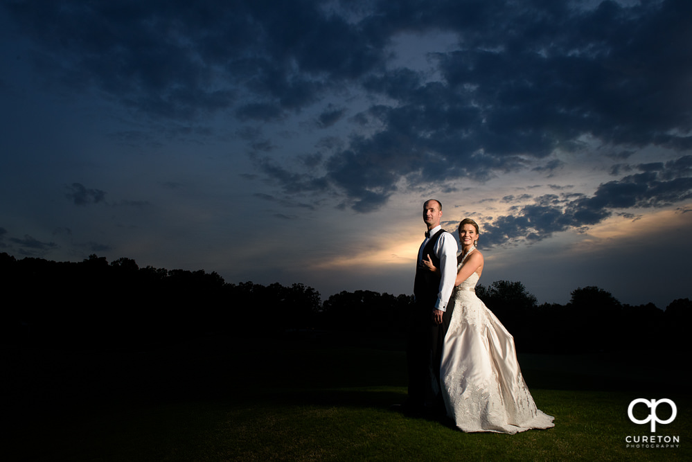 Bride and groom at sunset at Holly Tree.