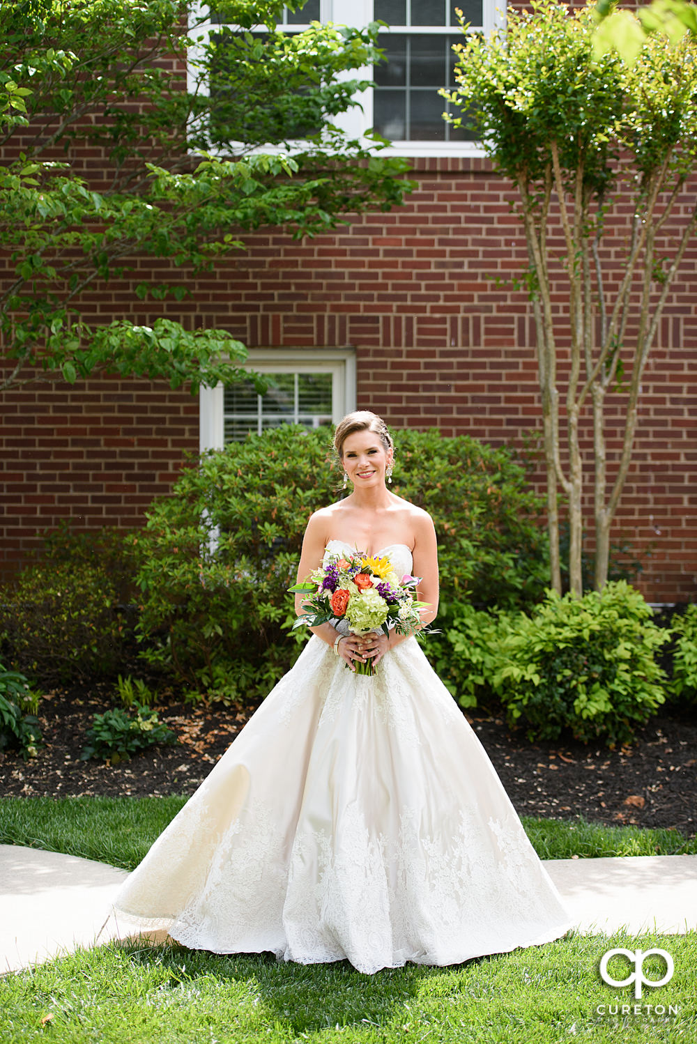 Bride in the courtyard at Mauldin United Methodist Church.