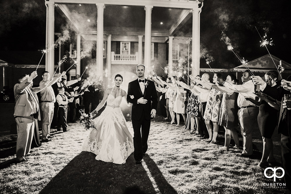 Bride and groom's sparkler leave at the Holly Tree Country Club wedding reception.