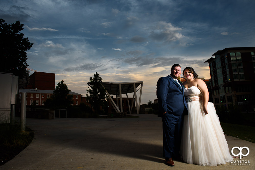 Bride and groom at sunset during the wedding reception at Huguenot Loft in downtown Greenville.