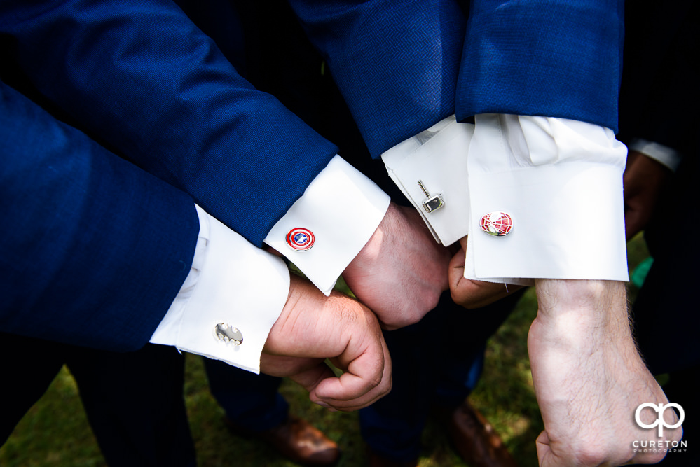 Custom super hero cufflinks for the groomsmen.