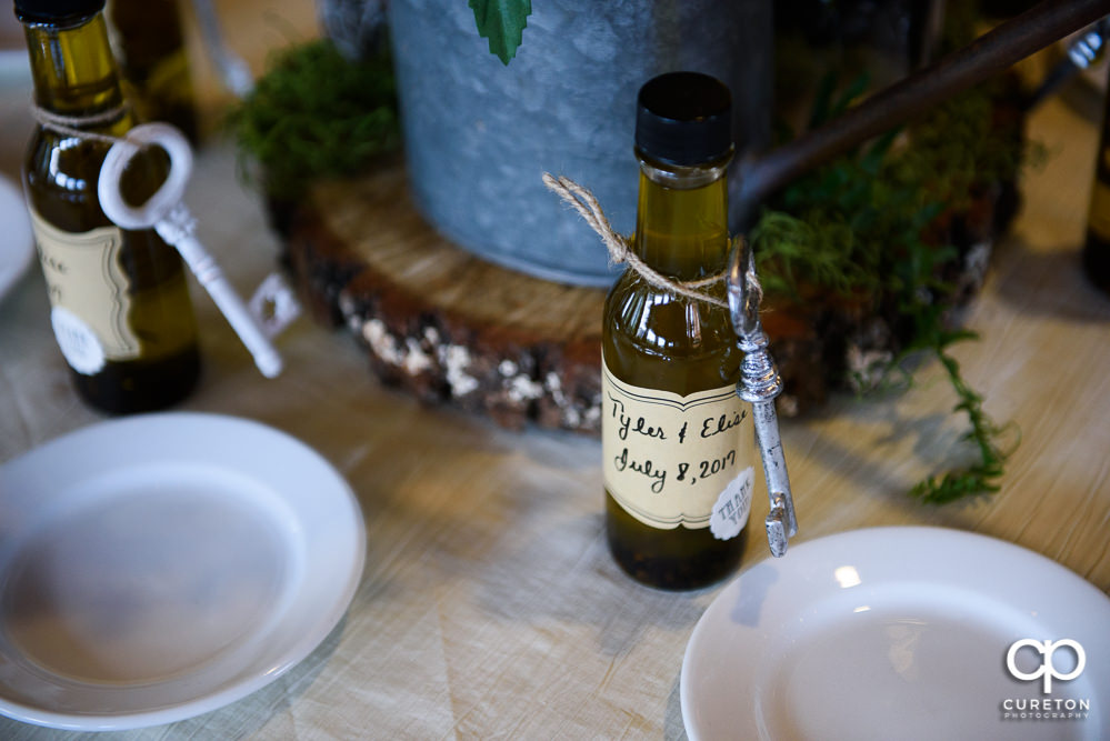 Custom labeled olive oil wedding favor.