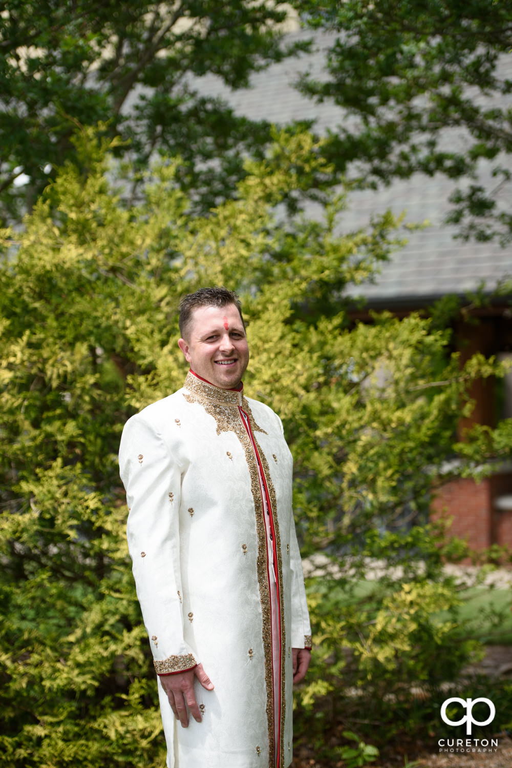 Groom in full Indian attire.