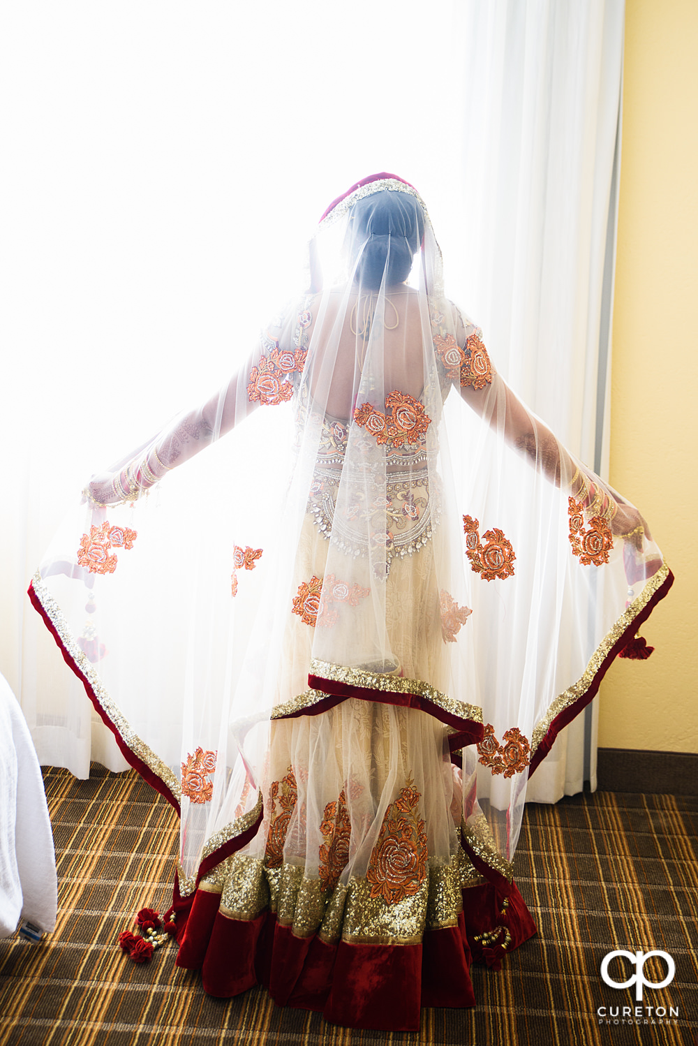 Indian bride in pretty light.