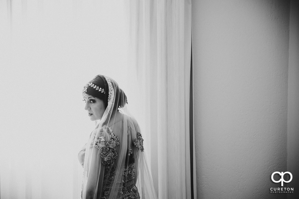 Indian bride in the window.