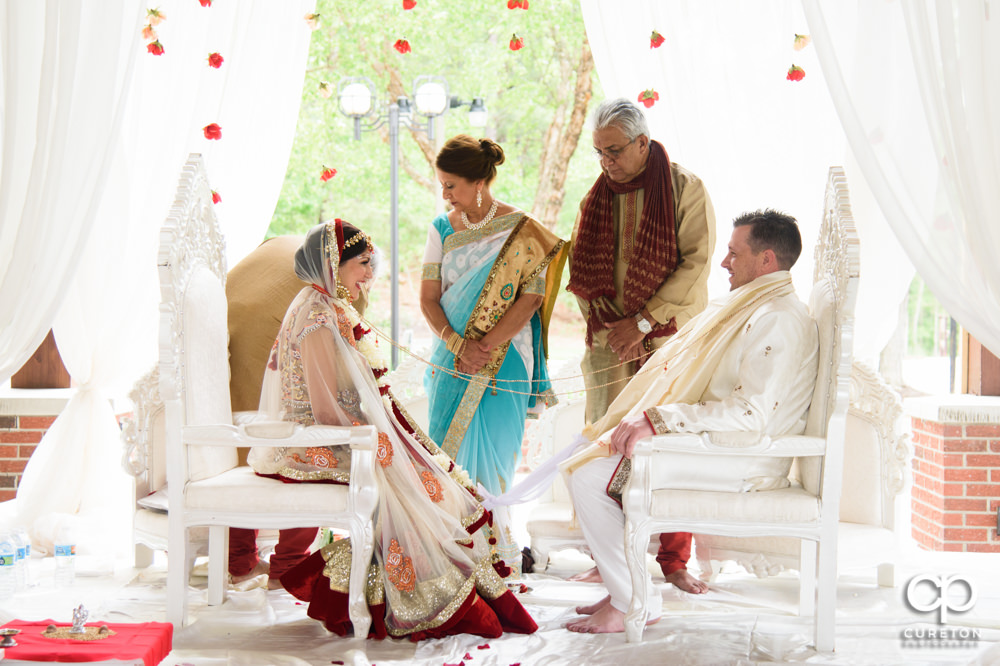 Outdoor Indian wedding ceremony at Embassy Suites hotel in Greenville SC.