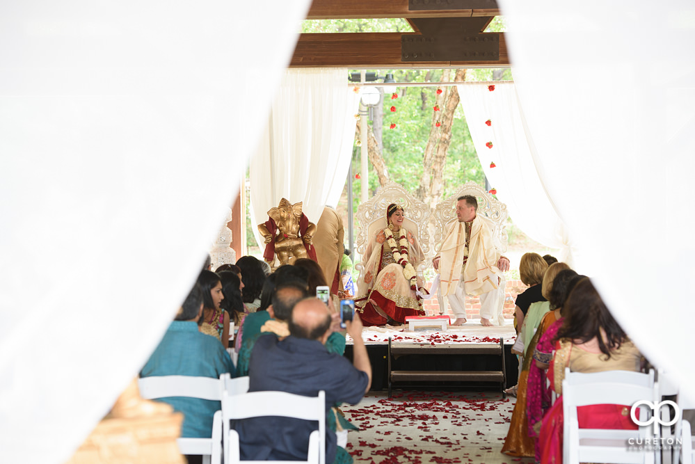 Outdoor Indian wedding ceremony at Embassy Suites hotel in Greenville SC.