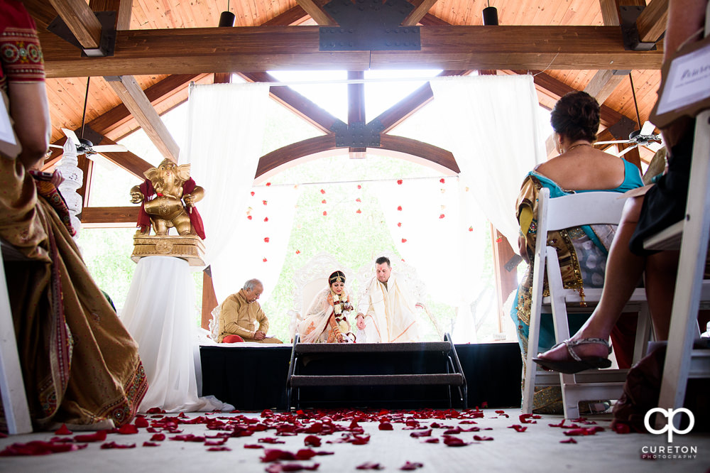 Outdoor Indian wedding ceremony at Embassy Suites hotel in Greenville SC.