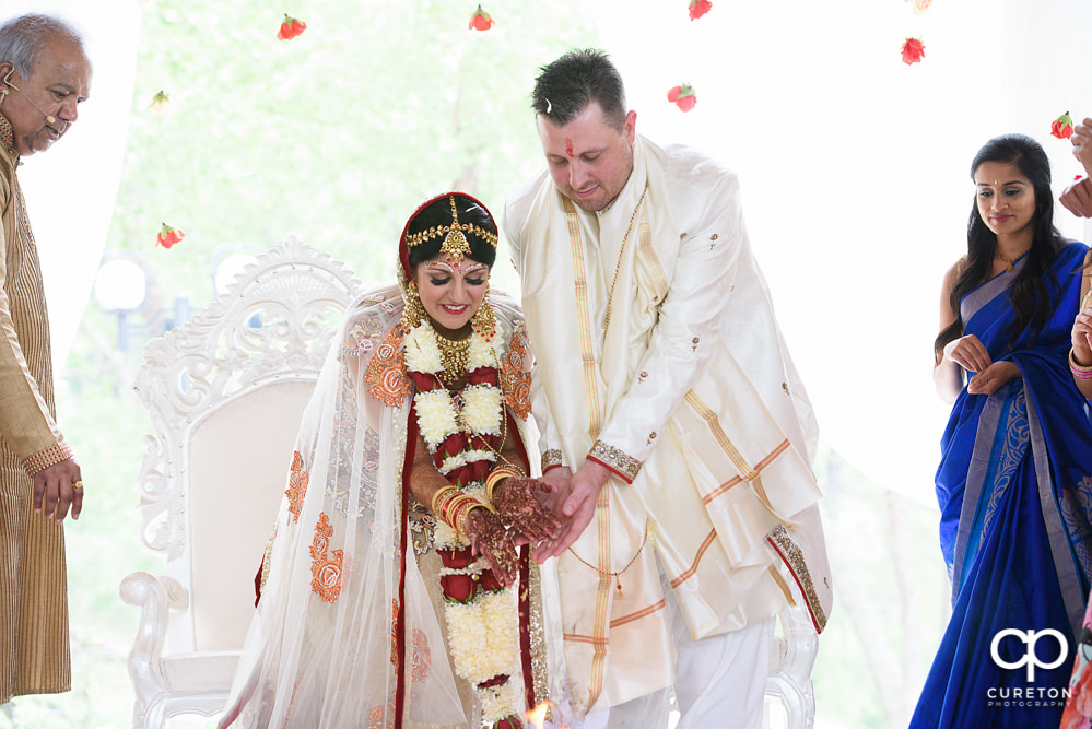 Outdoor Indian wedding ceremony at Embassy Suites hotel in Greenville SC.