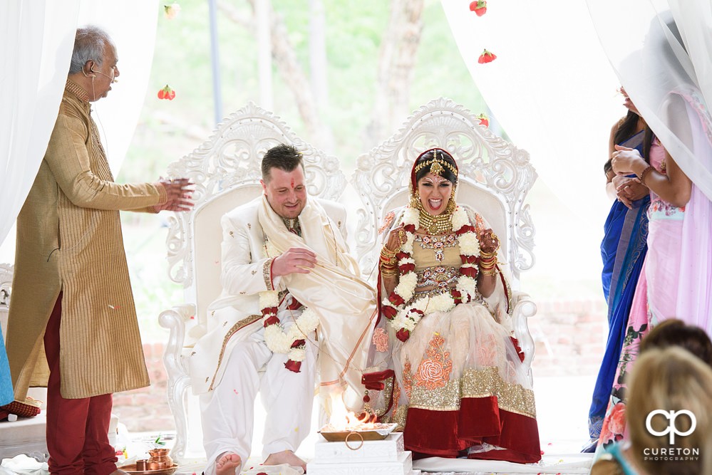 Outdoor Indian wedding ceremony at Embassy Suites hotel in Greenville SC.