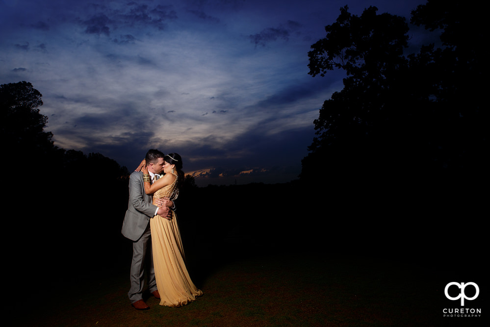 Bride and groom at sunset after their Greenville Indian wedding.