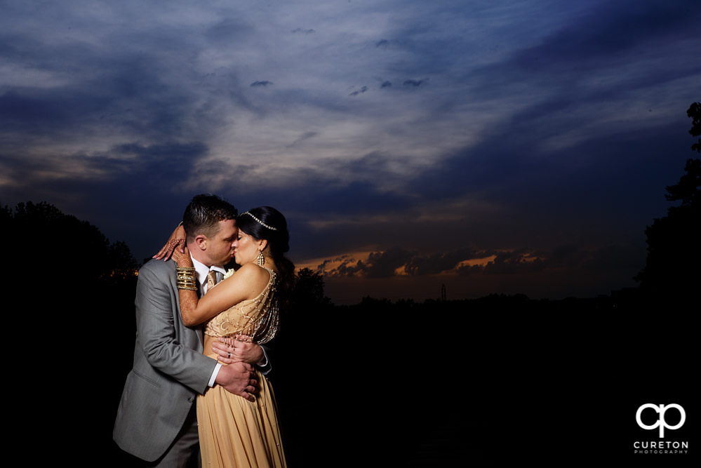 Bride and groom at sunset after their Greenville Indian wedding.