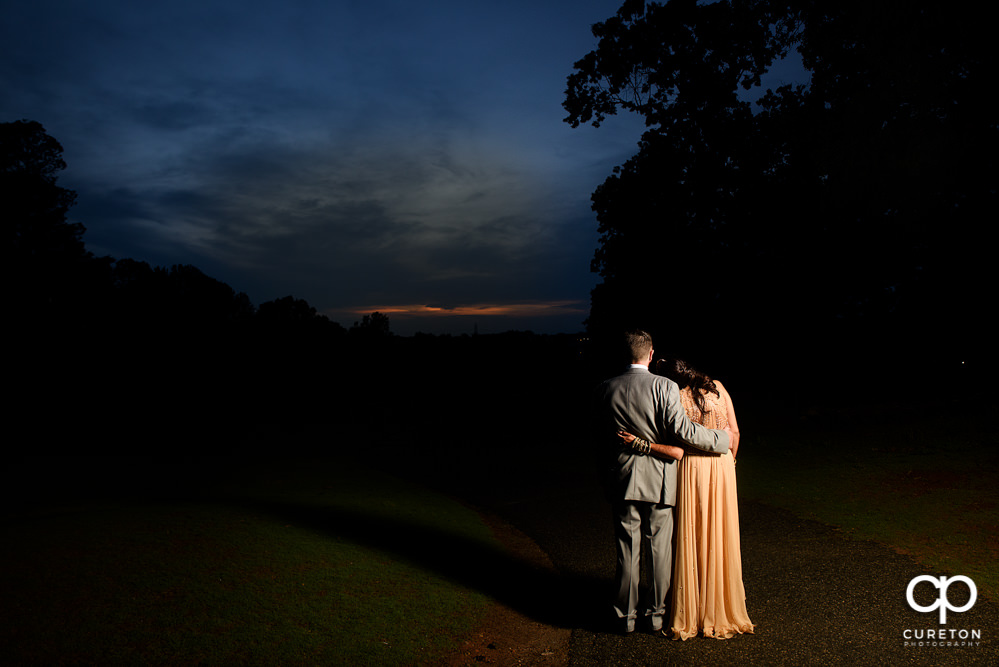 Bride and groom at sunset after their Greenville Indian wedding.