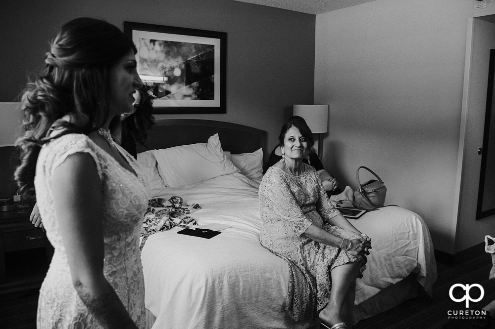 Indian bride getting ready for the second American wedding ceremony of the day.