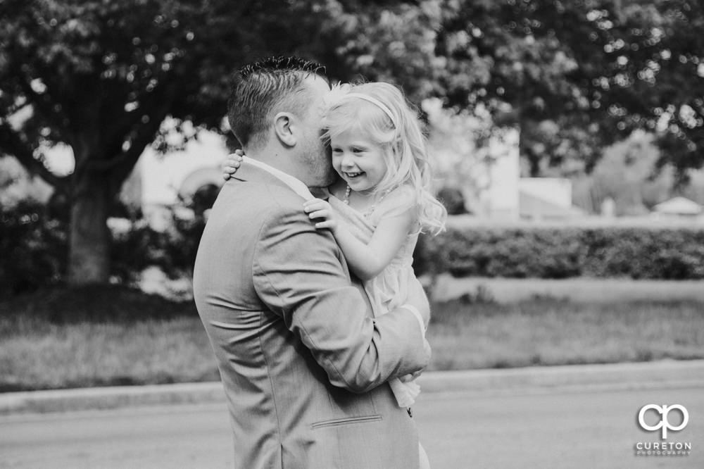 Groom and his daughter.