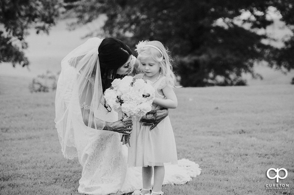 Grooms daughter joins the bride and groom before the wedding.