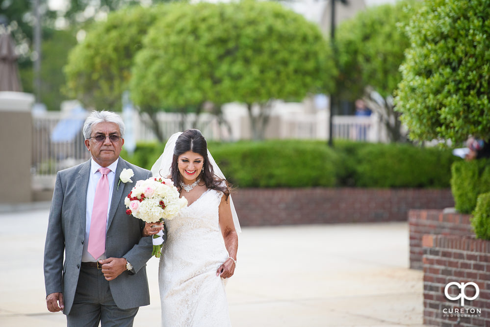 Outdoor wedding ceremony at Embassy Suites.