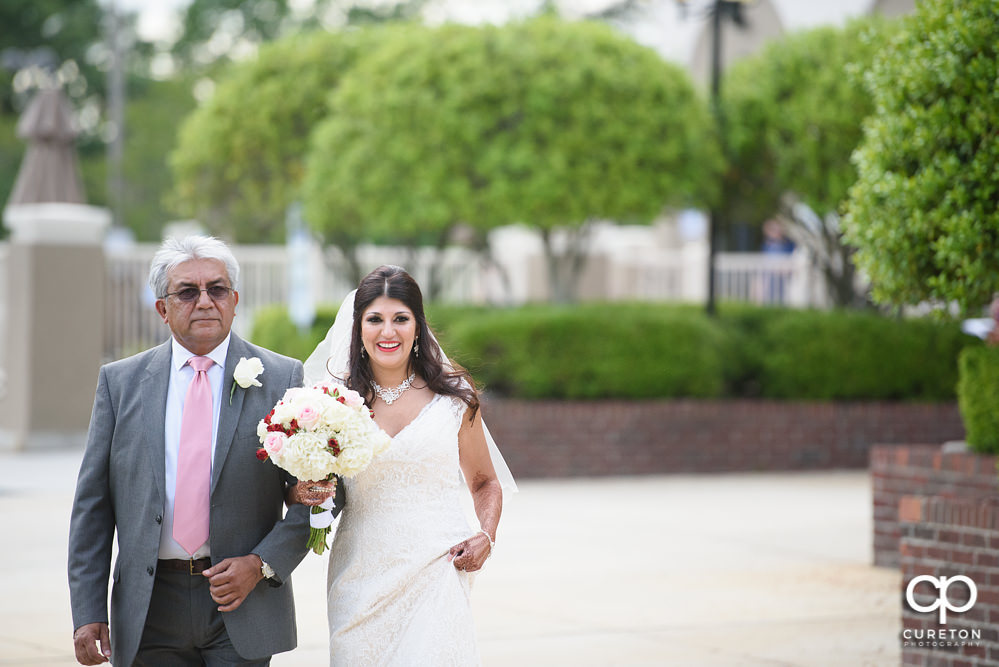 Outdoor wedding ceremony at Embassy Suites.