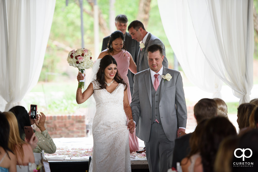 Outdoor wedding ceremony at Embassy Suites.