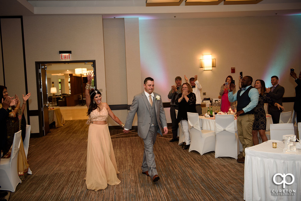 Bride and groom entrance into the reception.