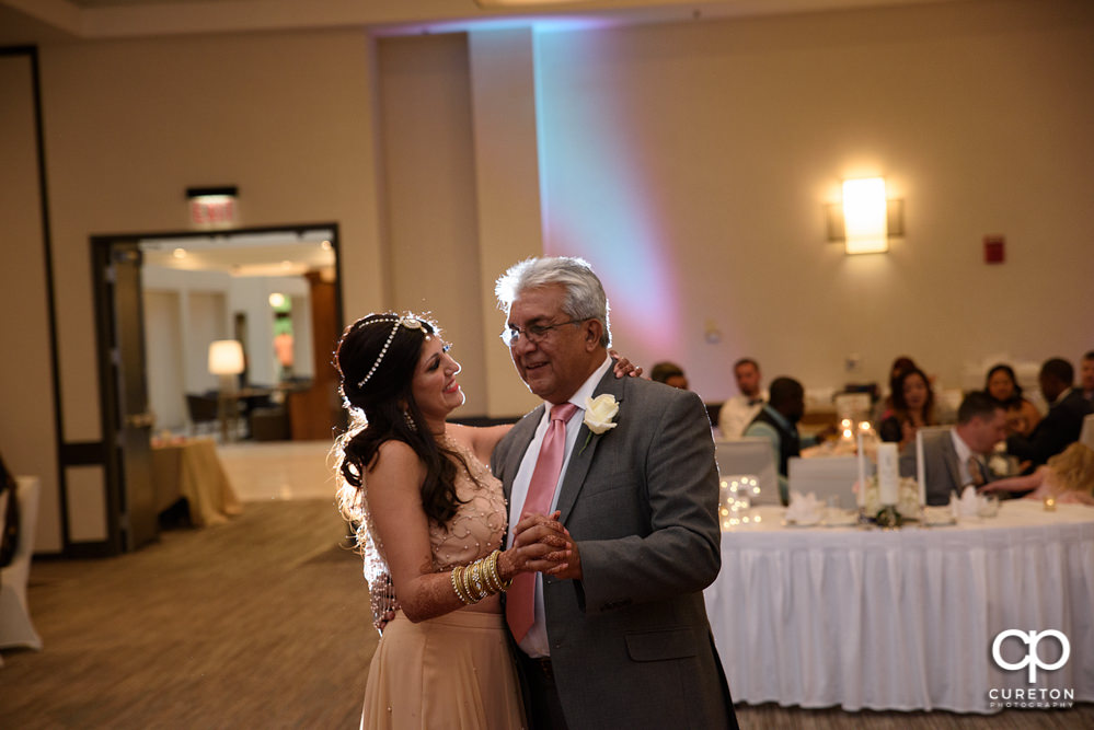 Bride and father dance.