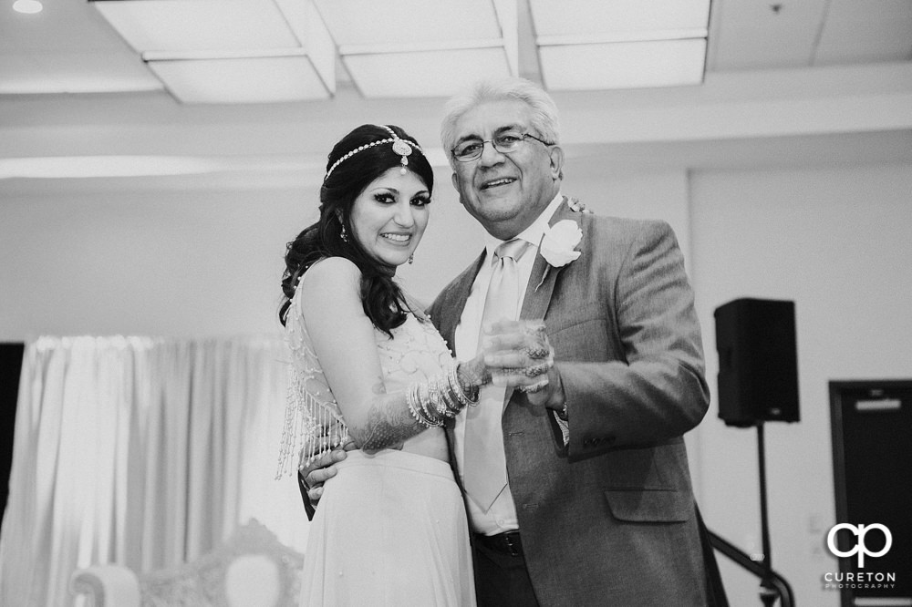 Bride and father dance.