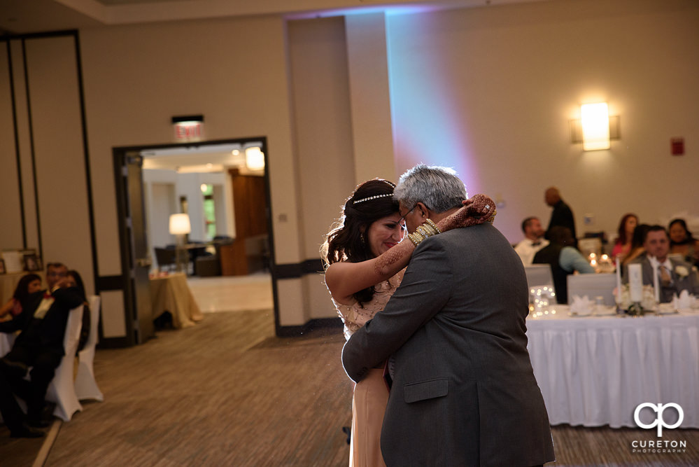 Bride and father dance.