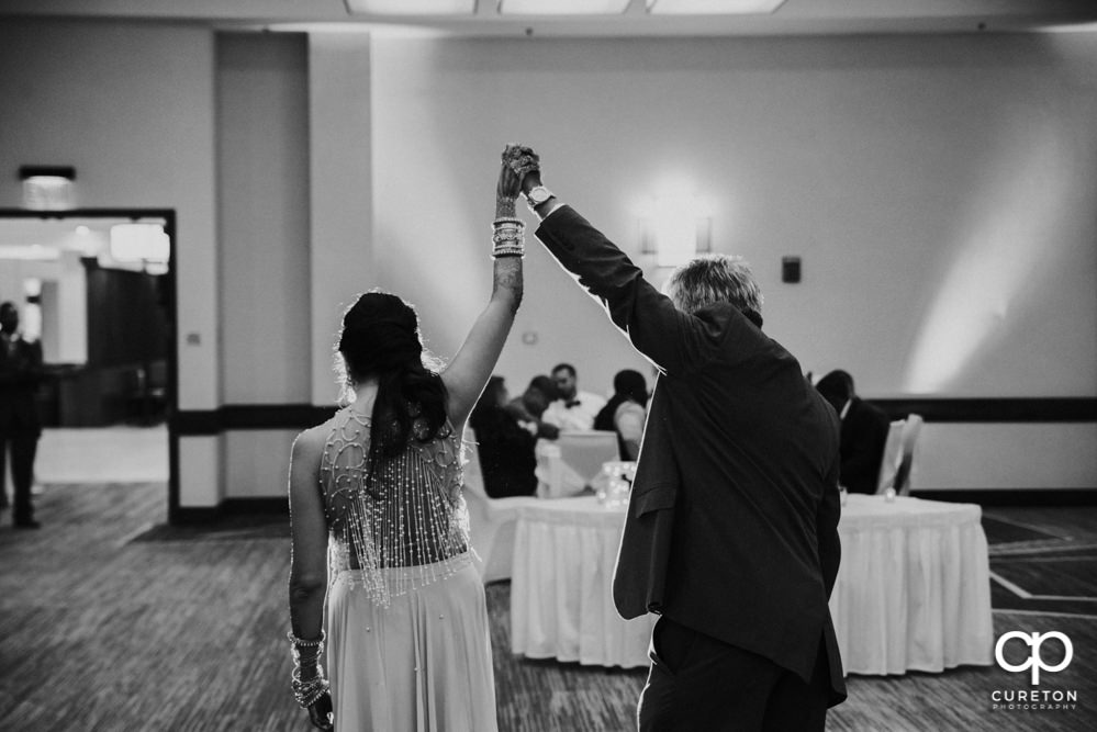 Bride and father dance.