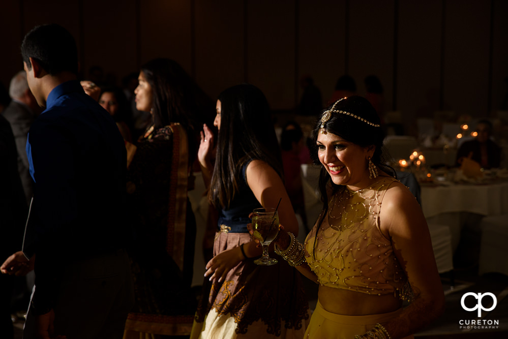 Wedding guests dancing at the reception.