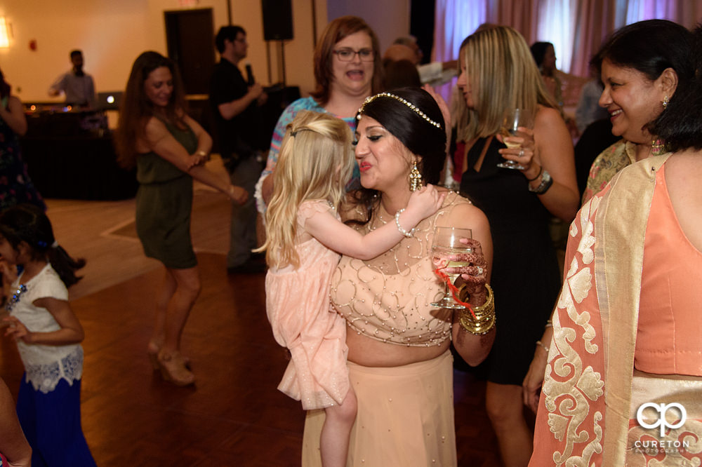 Wedding guests dancing at the reception.