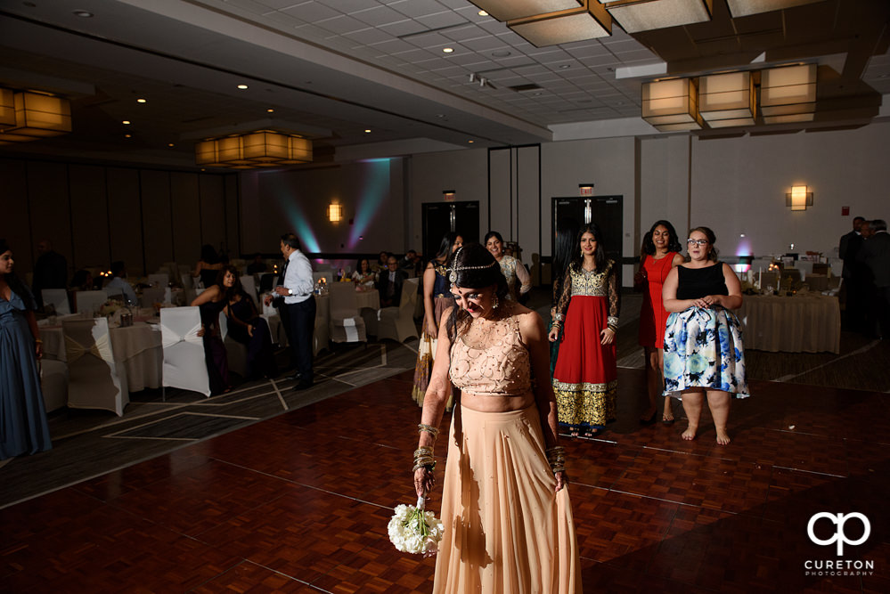 Bride tossing the bouquet.