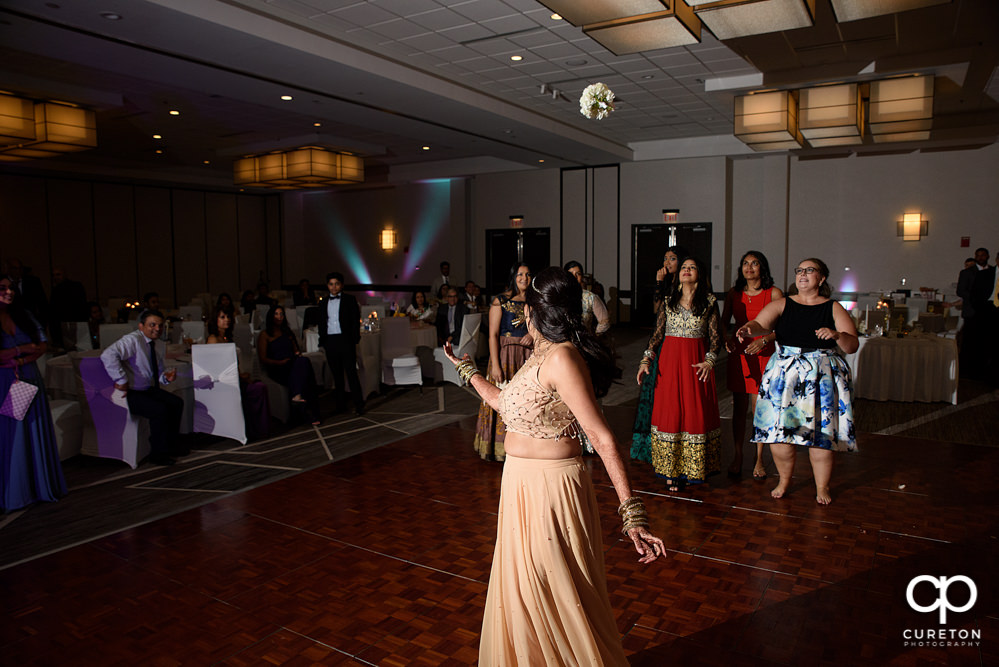 Bride tossing the bouquet.