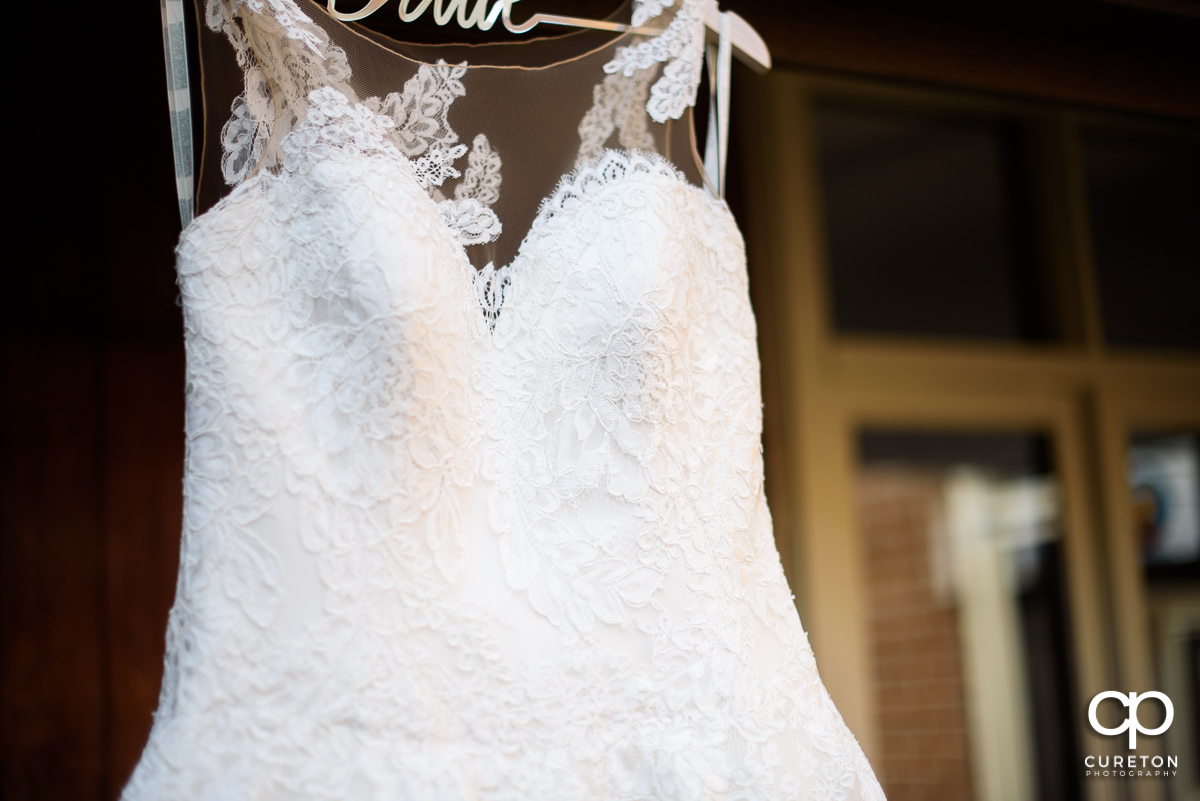 Detail on the bride's wedding dress.