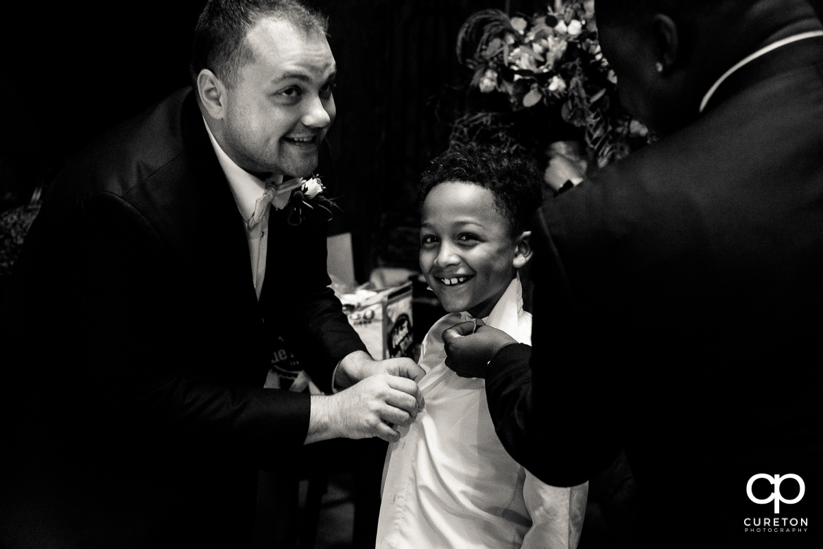 Groom's son getting ready.