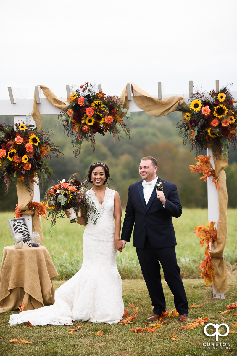 Bride and groom are announced as husband and wife.